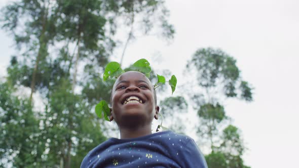 African girl jumping happily alt