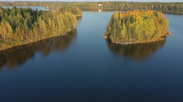 The Aerial Shot of the Small Tree Island in Lake Saimaa in Finland