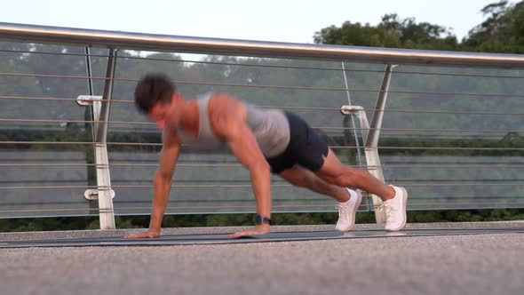 Muscular Man Athlete with Fit Body Do Pushups in Sporty Wear Biceps alt