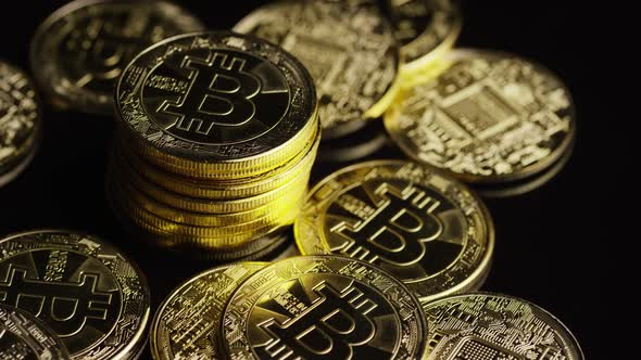Rotating shot of Bitcoins (digital cryptocurrency) - BITCOIN 0617 alt