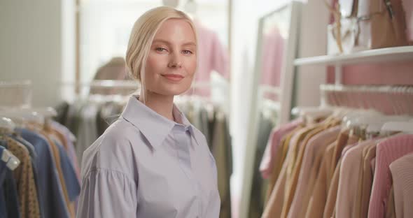 Confident Smiling Woman Retail Seller Entrepreneur Clothing Store Small Business Owner Looking at