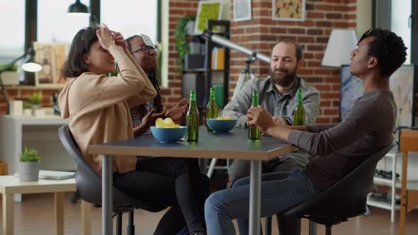 Group of Happy Friends Playing Board Games with Cards alt
