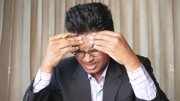 Depressed Man Feeling Sick and Worried About Financial Problem alt