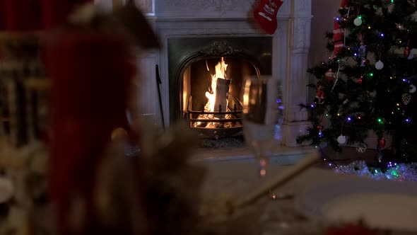 On Christmas Night the Fireplace with Decorations Burns