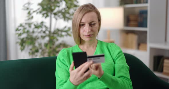 Woman with Mobile Enjoying Online Shopping