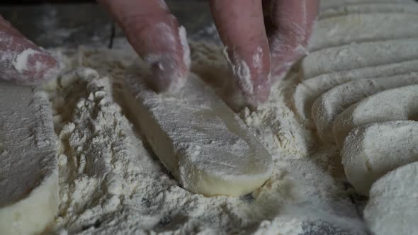 Roll the Pieces of Cheese in Flour Before Frying in a Pan alt
