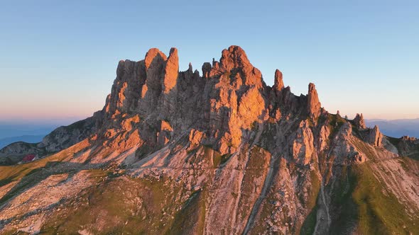 Dolomites mountains peaks on a summer sunrise alt