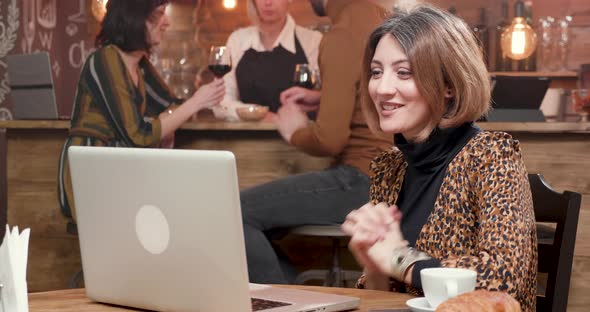 A Beautiful European Woman Having a Pleasant Conversation alt