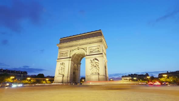 Arch of Triumph of Paris in the Champs Elysees at Sunset
