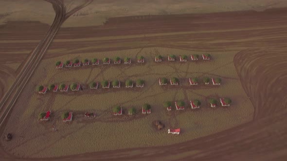 Beach with Deck-chairs and Blue Ocean, Aerial View alt