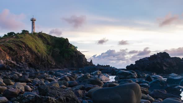 Lighthouse Over the Hill with Dramatic Sky