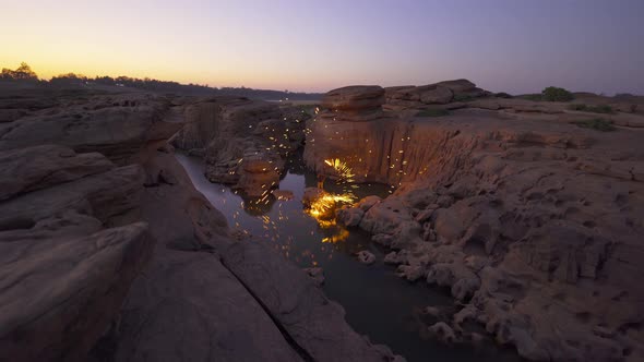 Spark fire swirl from steel wool at Sam Phan Bok, Ubon Ratchathani, Thailand. alt