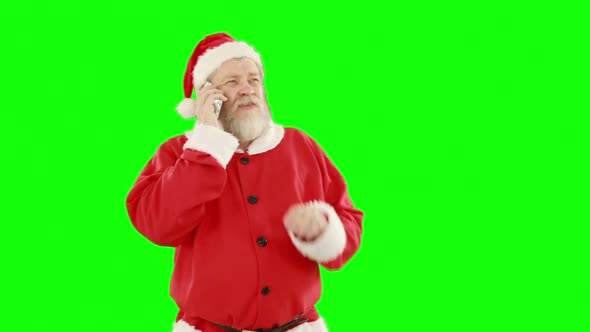 Santa claus talking on mobile phone alt