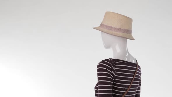 Mannequin in Striped Top Turning alt