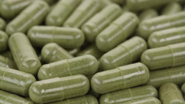 superfoods moringa capsules top view. Spirulina, chlorella capsules