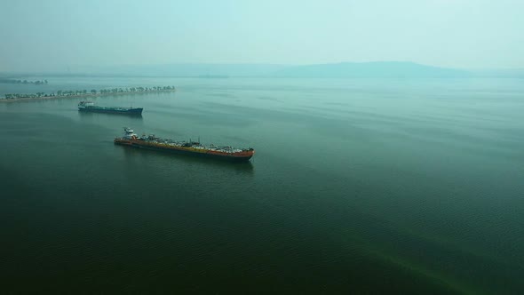 Aerial View, Barges with Cargo Are in the Sea. Cargo Barges Are on the Water, Water Transport.