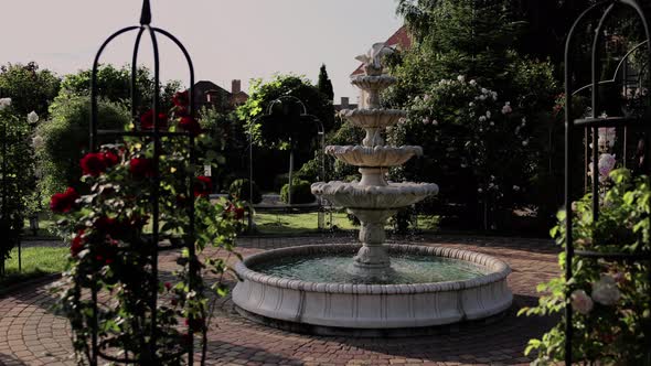 decorative fountain in the garden beautiful with water alt