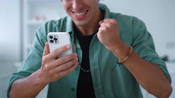 Closeup Excited Man Looking at Smartphone Celebrate Success Mobile Win Online Bet alt