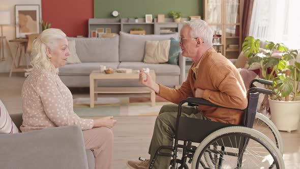 Spouses Playing Rock Paper Scissors alt