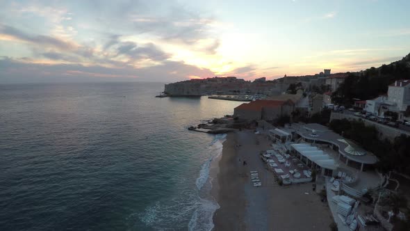Aerial of Banje Beach and the old port alt
