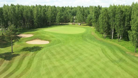 Top View of the Golf Course Located in a Wooded Area