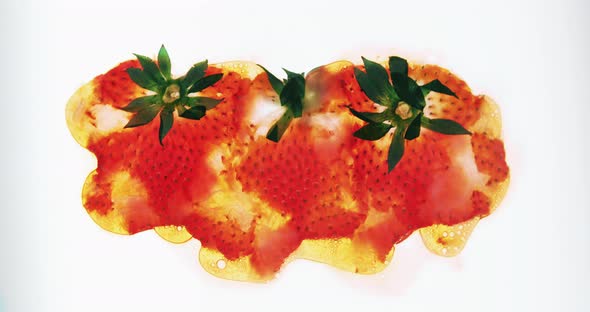 Crushing and Squeezing Three Whole Strawberry Berries alt