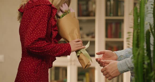 Girl Receives a Bouquet of Flowers on Valentine's Day