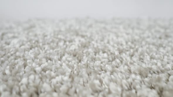 Closeup of Shaggy Silver Carpet Camera Movement alt