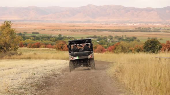 Ranger Four Wheeler Driving Down a Path in the Utah Mountains in the Fall 1080p 60fps alt