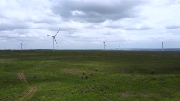 Aerial view of windmills farm for energy production