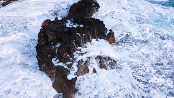 Ocean Waves Crash Against the Rocky Shore the Coastline of the Mediterranean Sea During a Storm alt