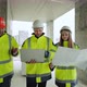 Building Inspection on Construction Site Young Female Architect and Foremen Real Estate Due - VideoHive Item for Sale