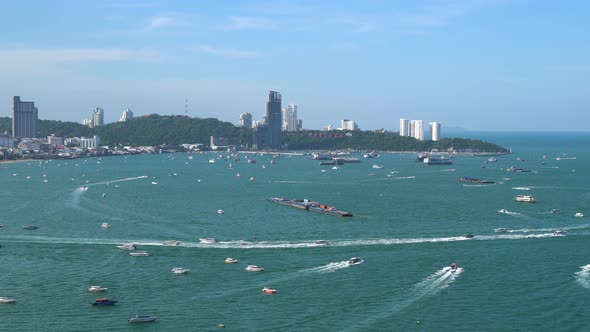 Pattaya bay and harbor, famous seaside tourist resort city, in sunny day, Chonburi, Thailand