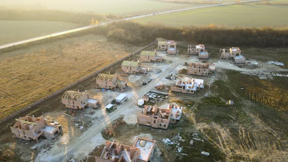 Industrial Building Site in Rural Area with Residential Houses Under Construction for Future Sale or alt