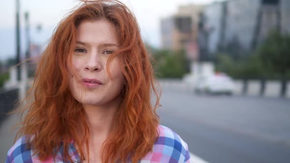 Portrait of Beautiful Redhead Woman Smiling Cheerful Enjoying Successful Urban Lifestyle alt
