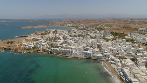 Aerial view of Naousa city, with traditional white houses, Greece. alt