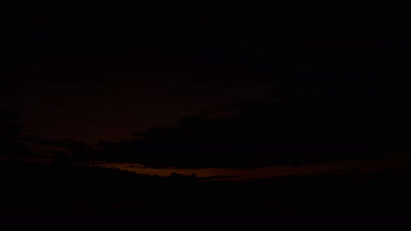 View of Colorful dramatic sky sunset or sunrise with Moving clouds background alt