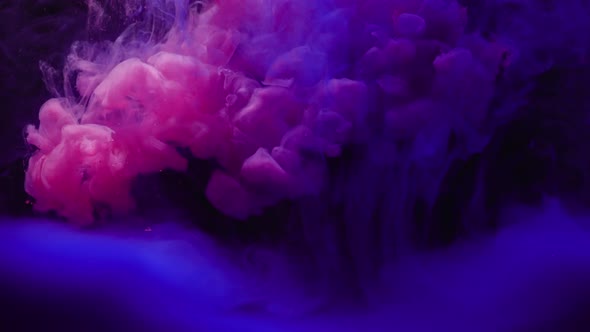 Abstract Of Blue And Pink Liquid Mixing