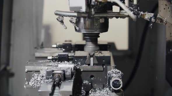 Automated Cnc Turning Lathe Machine Cutting Metal Part at Factory alt