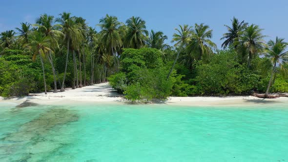 Aerial drone shot texture of marine bay beach trip by blue green lagoon and white sandy background o alt