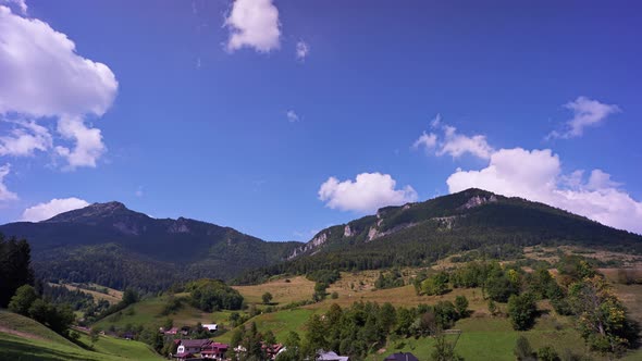 Carpathian Mountains Towering Over the Village