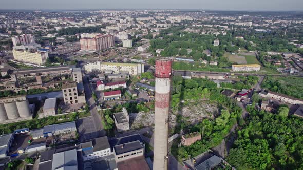 Buildings and Materials Warehouse in the Industrial City Zone From Above alt