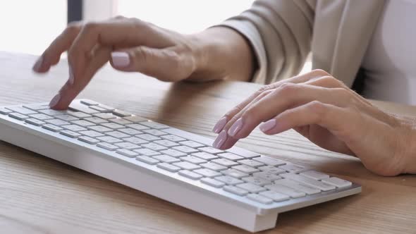 Lady Hands Working on Keypad alt
