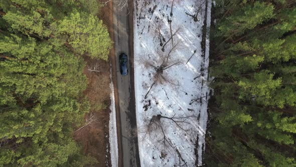Aerial view of car moving on the road