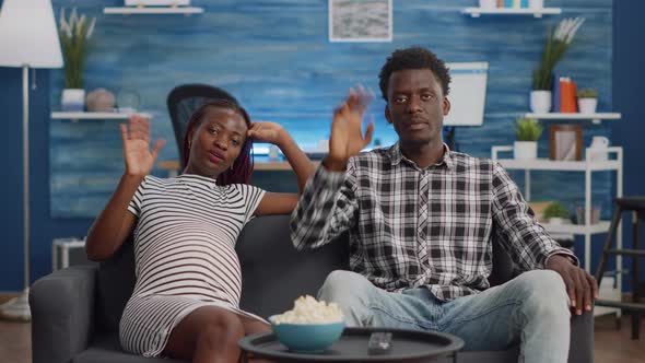 Black Married Couple with Pregnancy Talking on Video Call alt