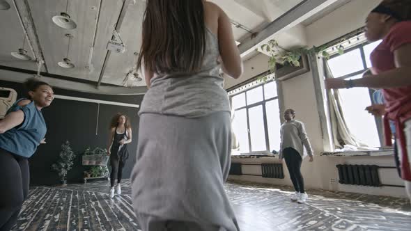 Happy Women Rehearsing Dance alt