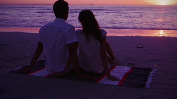 Young couple by the sea alt