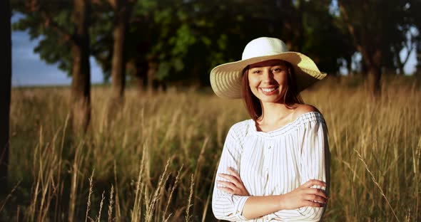 Portrait of Happy Woman on Field