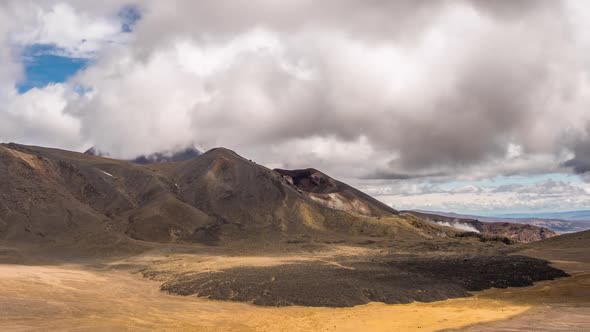 Sunny Summer Day with Grey Clouds over Volcano Mountains Nature in New Zealand alt