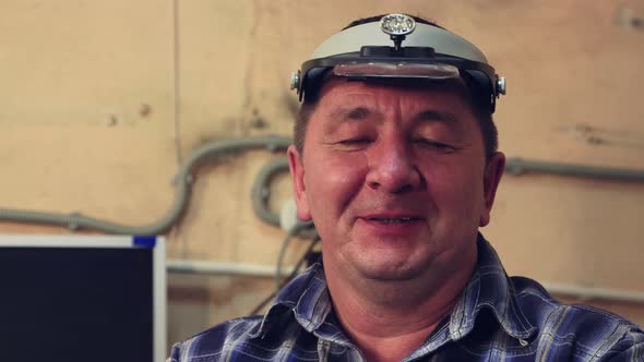 Closeup of a Master Looking at the Camera Man Talking and Smiling alt